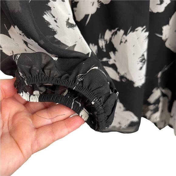 Love…Ady Black and White Floral Long Sleeve Romper - Picture 7 of 7